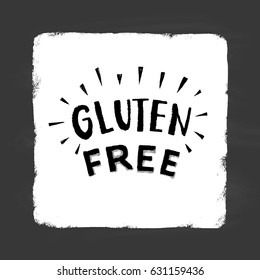 Chalk lettering on a white square. The text "gluten free" on a chalkboard. Poster for the vegan bar.
