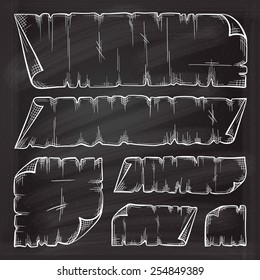 Chalk set of empty paper vintage sketches on the blackboard