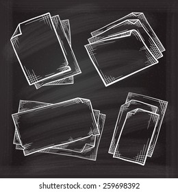 Chalk set of empty paper vintage sketches on the blackboard