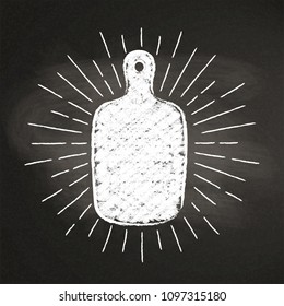 Chalk silhoutte of cutting board  with vintage sun rays on blackboard. Good for cooking logotypes, bades, menu design or posters.