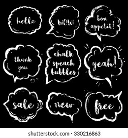 Chalk speech bubbles set with short phrases(hello, wow, bon appetit, thank you, yeah, sale, new, free). Vintage hand drawn vector illustration.Isolated elements.