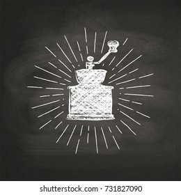Chalk textured coffee mill silhouette with vintage sun rays on black board. Vector coffee grinder  illustration for drink and beverage menu or cafe theme, poster, t-shirt print, logo.