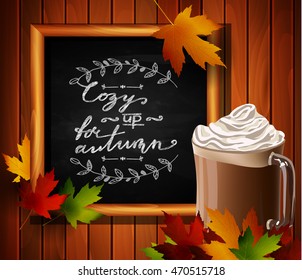 Chalkboard with autumn leaves