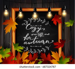 Chalkboard with autumn leaves