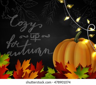 Chalkboard with autumn leaves and pumpkin