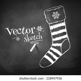 Chalkboard drawing of Christmas sock. Vector illustration. Isolated.