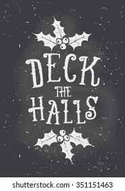 Chalkboard style Christmas greeting card template with text "Deck the Halls" and holly decoration.