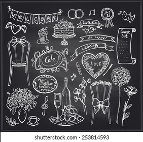 Chalkboard wedding banquet elements - flowers, sweets, ribbons and labels.