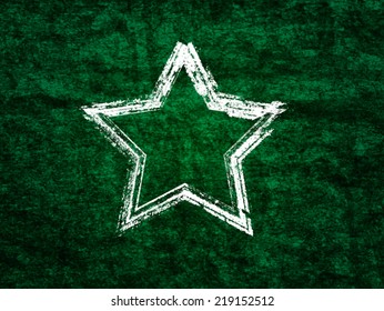 Chalked star shape on the chalkboard. Vector design.