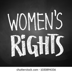 Chalked vector hand written Women's Rights slogan on blackboard background.