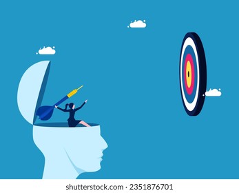 challenge to be successful at work. Focused businesswoman aiming darts to hit the target