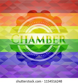 Chamber emblem on mosaic background with the colors of the LGBT flag