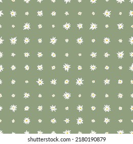 Chamomile floral mille fleur seamless pattern on green background. Small summer flowers in simple scandinavian cartoon doodle style perfect for textile, wallpaper, fabric