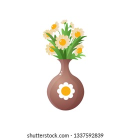 Chamomiles in brown vase isolated on white background