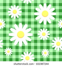Chamomiles on green checkered background, seamless pattern