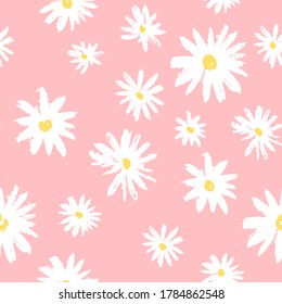Chamomiles on a pink background. Seamless pattern