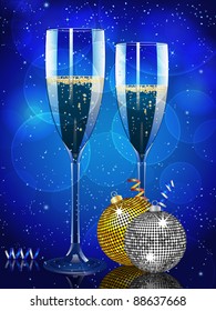 Champagne flutes on a blue background with Christmas baubles and streamers