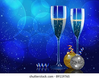 Champagne flutes on a blue background with Christmas baubles and streamers