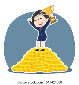champion asian businesswoman on pile of coins
