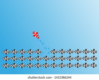 Change Group of red fish change disruptive  in one direction and with one individual pointing in the different way. Business concept for change  new ideas creativity and innovative solution disrupt