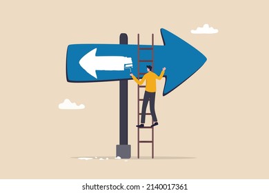 Change to opposite direction, hesitate business decision to change to better opportunity, conflict or reverse direction, career path concept, businessman paint opposite direction arrow on arrow sign.
