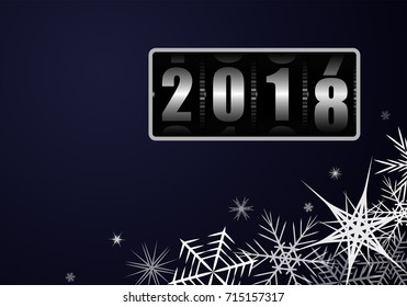 Change of the year on the drum counter from 2017 to 2018 with white snowflakes. Billet for postcard or poster