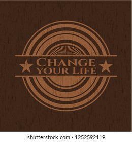 Change your Life badge with wood background