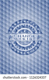 Change your Life blue badge with geometric pattern.