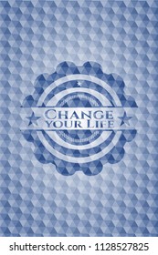 Change your Life blue emblem or badge with abstract geometric pattern background.