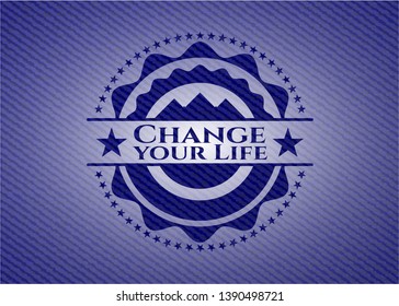 Change your Life emblem with jean high quality background. Vector Illustration. Detailed.