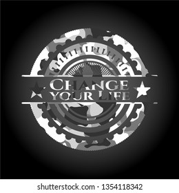 Change your Life on grey camouflaged texture