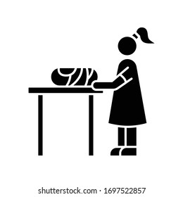 Changing table black glyph icon. Restroom for mom and child. Mother changing diaper for baby. Newborn kid care. Nanny dressing infant. Silhouette symbol on white space. Vector isolated illustration