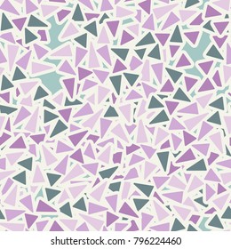 Chaos from rounded triangles. Glamorous camouflage. Seamless texture.