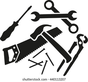 Chaos of working tools - screwdriver, wrench, hammer, saw, plier, nails