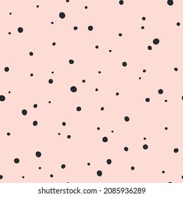 Chaotic abstract pink and grey polka dots pattern for party, celebration, bedding, baby clothes or home decor. Seamless vector design. Adorable and sweet hand drawn background.