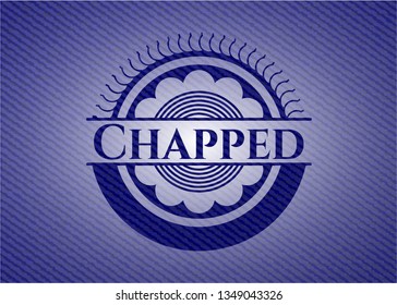 Chapped jean or denim emblem or badge background