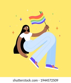 A character to a black girl in jeans and a white T-shirt. Waving a striped rainbow flag. Support for the LGBT community. Yellow background with stars. Flat bright vector illustration