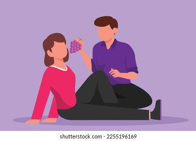 Character flat drawing happy young man feeding grapes fruit to woman at outdoor. Romantic couple having picnic in summer park. Relaxing together sitting on ground. Cartoon design vector illustration