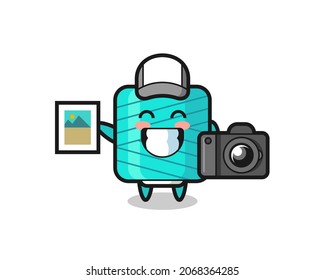 Character Illustration of yarn spool as a photographer , cute style design for t shirt, sticker, logo element