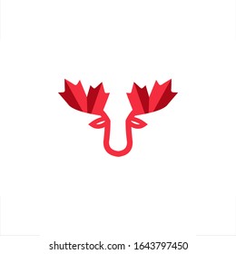 character or mascot of moose with maple leaf on head
