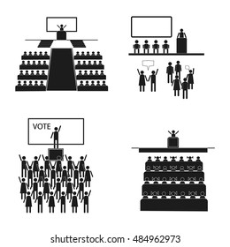 Character set voting, elections. Stick in the public hall. A large number of people sitting in the hall listening to the speaker.