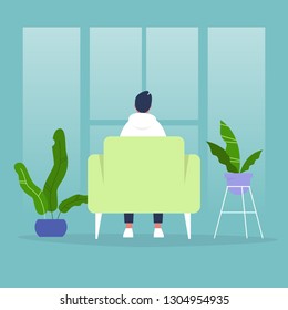 Character sitting in a chair in front of the window. Back view. Interior concept. Flat editable vector illustration, clip art