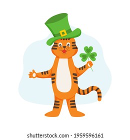 The character tiger cub in a green hat is holding a clover. March, early spring, St. Patrick's Day, the symbol of the year. Flat cartoon vector illustration.