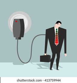 Charging for manager. Businessman charged from battery charger. Energizes a man in suit. Tie and suitcase
