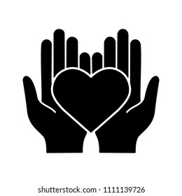 Charity glyph icon. Silhouette symbol. Life insurance. Medicine and healthcare. Hands holding heart. Negative space. Vector isolated illustration
