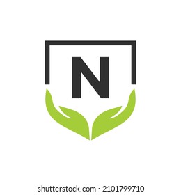 Charity Help Hands Logo On Letter N Concept Template. Care, Sharing, Charity, Medical Health, Donation Organization N Logotype Design