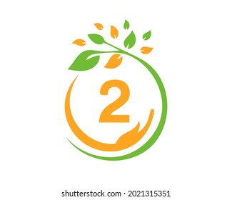 Charity logo with hand, leaf and 2 letter concept. Hand care foundation logo design