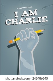 I Am Charlie Slogan with a hand holding a pencill for freedom of expression
