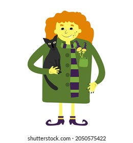 A charming red-haired witch in a green coat, a scarf and with a cat in her hands, toadstools sticking out of her pocket. Halloween illustration in cartoon childish style for your holiday design.