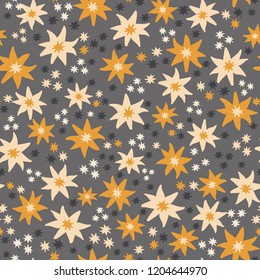 Charming star shaped flowers in a small all over print. Seamless vector pattern. Warm gray/ grey, ivory, black, orange, yellow. Great for textiles, quilting, stationery, invitations, fashion & paper.